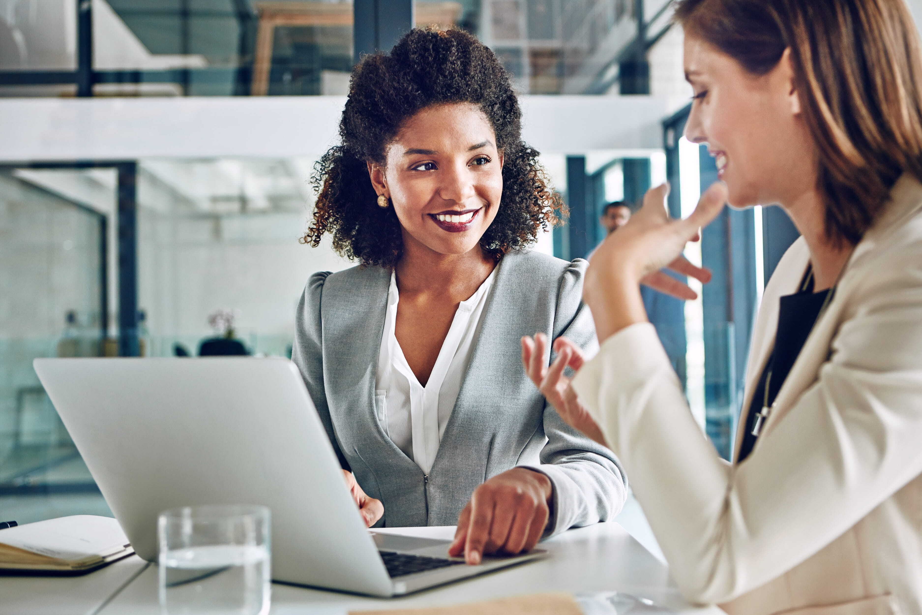 laptop-meeting-happy-business-women-office-discussion-talking-consulting-online-proposal-corporate-financial-advisor-people-computer-planning-website-report (1)