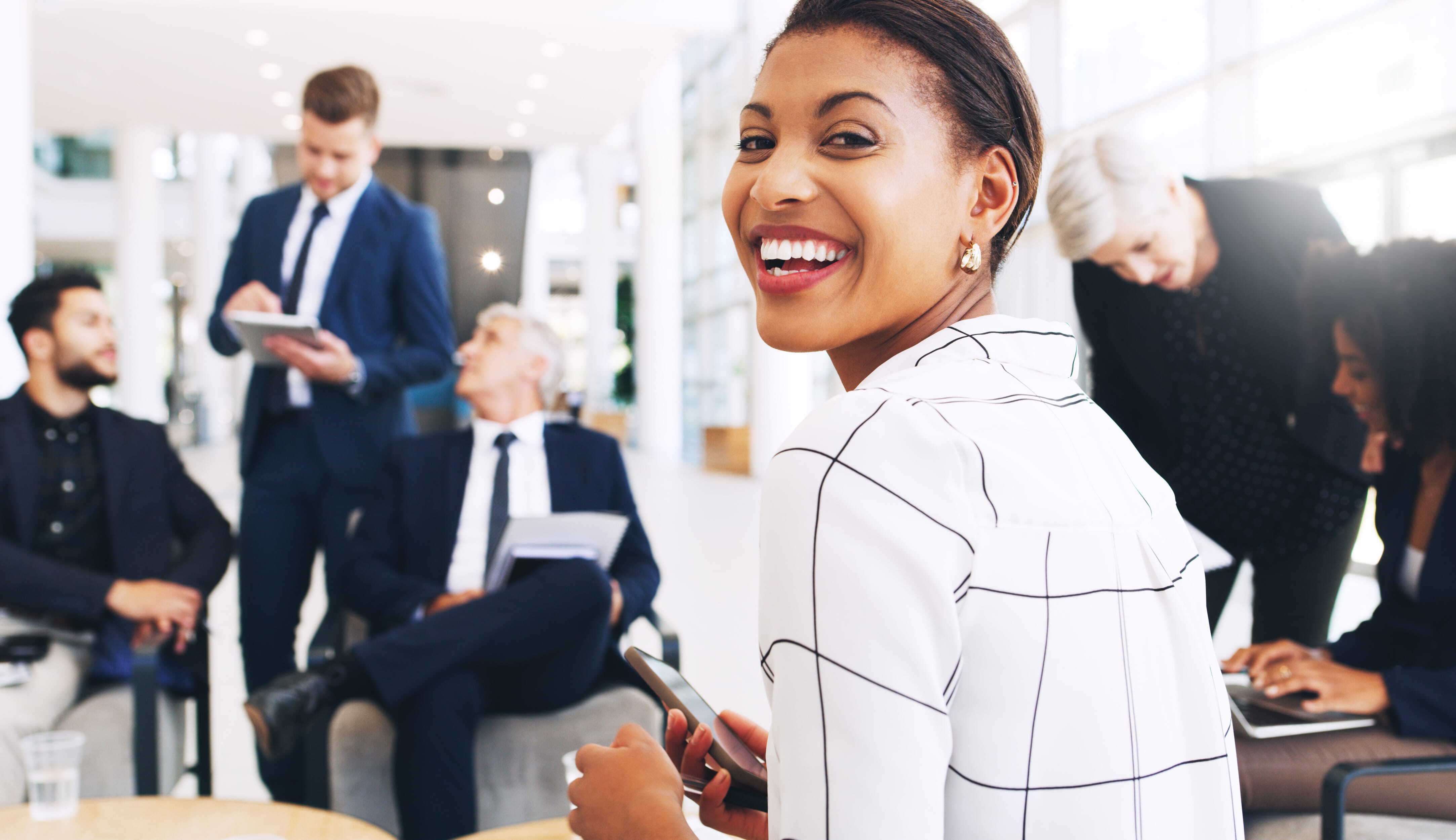 leadership-portrait-woman-meeting-happy-confident-brainstorming-with-colleagues-corporate-professional-discussion-sales-business-people-collaboration-project (1)